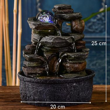 Джерело води Zen'Light від Zimmerbrunnen: природний водоспад з ефектом каменів та кольоровим LED-підсвічуванням. Ідеальна декор для дому, медитації та релаксації. Об'єкт Фен-Шуй для щастя. Висота 23 см (Satya)