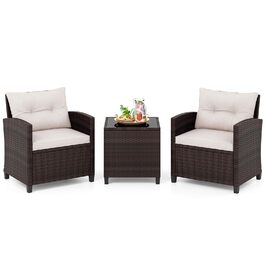 Набір садових меблів COSTWAY з ротангу для балкона та тераси, 3 предмети: 2 крісла, стіл зі скляною стільницею, подушки. Колір: коричневий + білий.