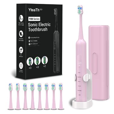 Електрична звукова зубна щітка для дорослих і дітей, 5 режимів чищення, 3 рівні інтенсивності, таймер, 8 насадок, кейс для подорожей, акумуляторна (Рожева, 1 шт.)