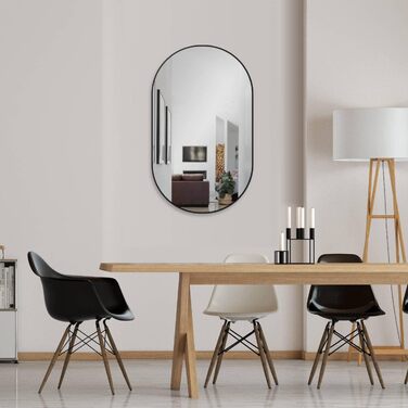 Дзеркало настінне овальне HOKO Design 45x75 см з металевим каркасом матовий чорний. Можлива вертикальна та горизонтальна установка. Для ванної кімнати, коридору, спальні.