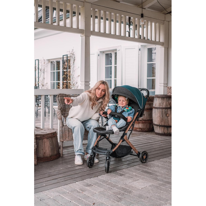 Дитяча коляска MoMi Estelle (6 місяців+, до 15 кг), сіро-золота. Зручна, компактна, з 5-точковим ременем безпеки, кошиком для покупок та функцією лежання. Телескопічна ручка для зручного пересування.