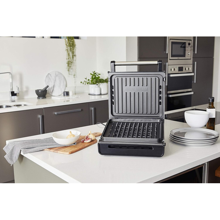 Контактний гриль George Foreman з антипригарним покриттям для приготування паніні та сендвічів [Без диму - 87% менше диму] Настільний гриль (знімні та придатні для миття в посудомийній машині пластини, температура 200°C, корпус з нержавіючої сталі) 28000-