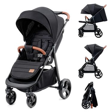 Дитяча коляска Kinderkraft Grande Plus, сіра, від народження до 22 кг, складається однією рукою, регульована спинка, великий капюшон з віконцем, амортизація всіх коліс