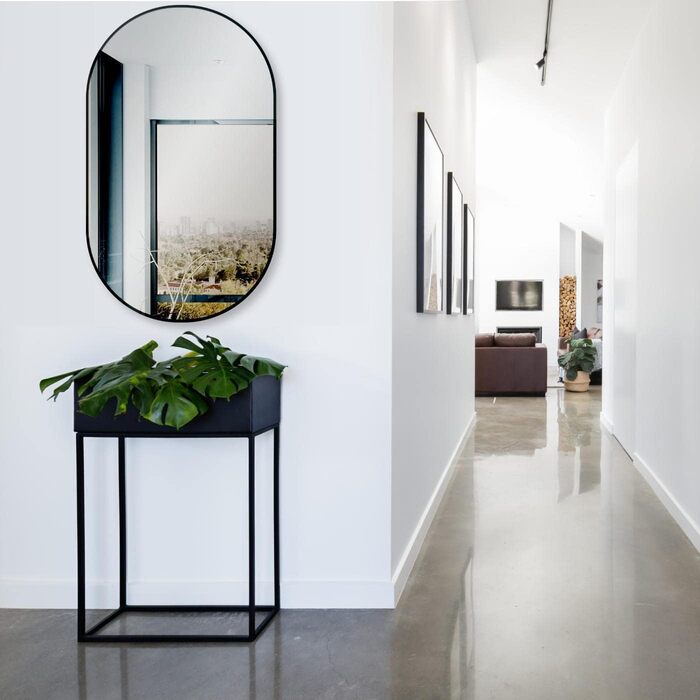 Дзеркало настінне овальне HOKO Design 45x75 см з металевим матовим каркасом. Можлива вертикальна та горизонтальна установка. Підходить для ванної кімнати, коридору, спальні та вітальні.