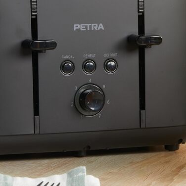 Тостер Petra PT5565MBLKVDE на 4 тости, 1850 Вт, чорний, 7 режимів, функції розморожування, повторного нагріву і відміни, антизастрягальна система, висувний лоток для крихт, самовирівнювання тостів