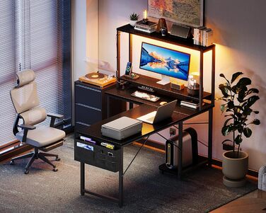 Ігровий стіл Coleshome L-подібної форми з LED-підсвічуванням та розетками, 110 × 80 см. Реверсивний стіл з полицями для зберігання, чорний. Підходить для home office та геймінгу.