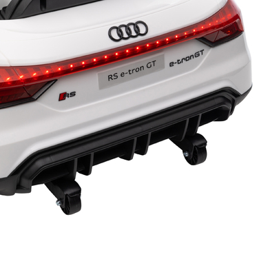 Дитячий електромобіль Audi RS e-tron GT з ременем безпеки, пультом дистанційного керування, фарами, музичною функцією, білий колір, розміри 103 x 58 x 41 см